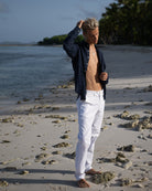 Tropical island vacation classic linen pants styled with Eclipse navy blue linen shirt. Designer linen resortwear by Pink House 