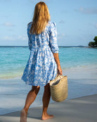 Back view of women’s blue Iguana linen Amy dress by Pink House Mustique, coastal resortwear style.