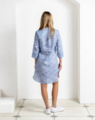 Luxury women’s linen Decima dress in Coral Stone Blue by Pink House Mustique, elegant resort wear.