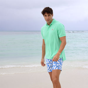 Beach holiday men's swim shorts in blue Parrot print by designer Lotty B