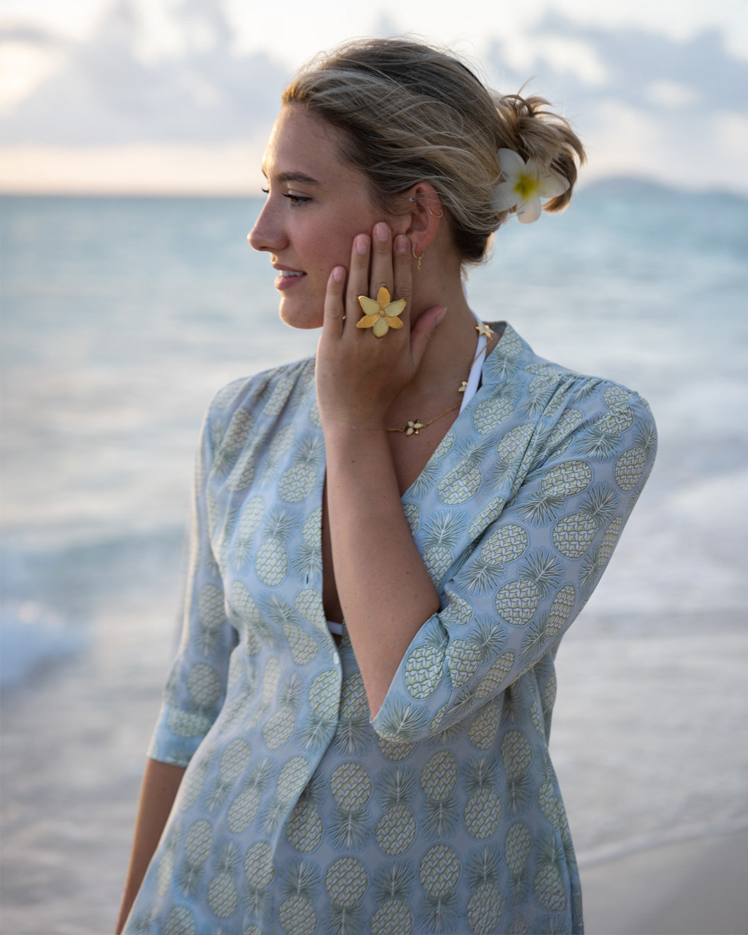 Romantic beach look with Pink House silk Decima Dress in Pineapple Olive – tropical resort dress styled with flower jewelry, ideal for sunset walks and island style.