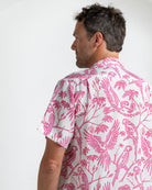 Back view of silk shirt in parrot pink print – breathable designer resortwear for men by Pink House Mustique
