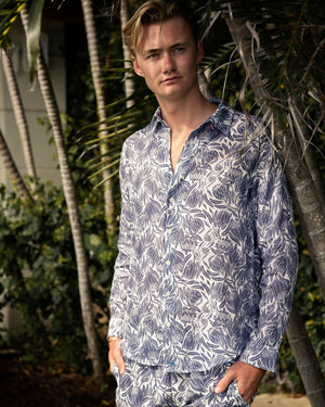 Mens designer vacation wear linen shirt in aubergine blue Protea print