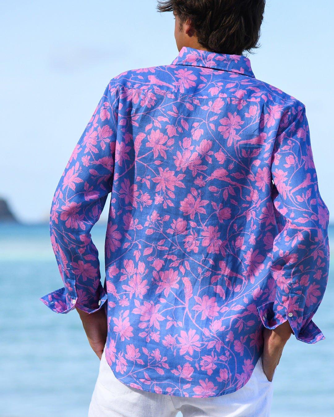 Back view of men’s Iguana Blue & Pink linen shirt — lightweight pre-washed linen with vibrant lasting colours.