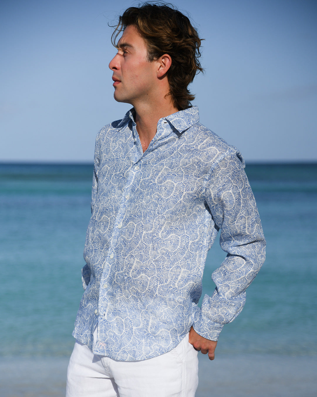 Men’s linen shirt in Coral Stone Blue print by Pink House Mustique, luxury beachwear Resort 2026.