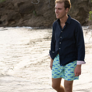 Sustainable Mens beach wear for holidays in green & blue Egret bird print