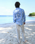 Back view of men’s Iguana Blue linen shirt — lightweight pre-softened linen with vibrant lasting colours.