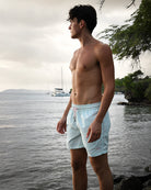 Men’s Coral Stone Aqua swim shorts by Pink House Mustique, tropical island lifestyle by the sea.