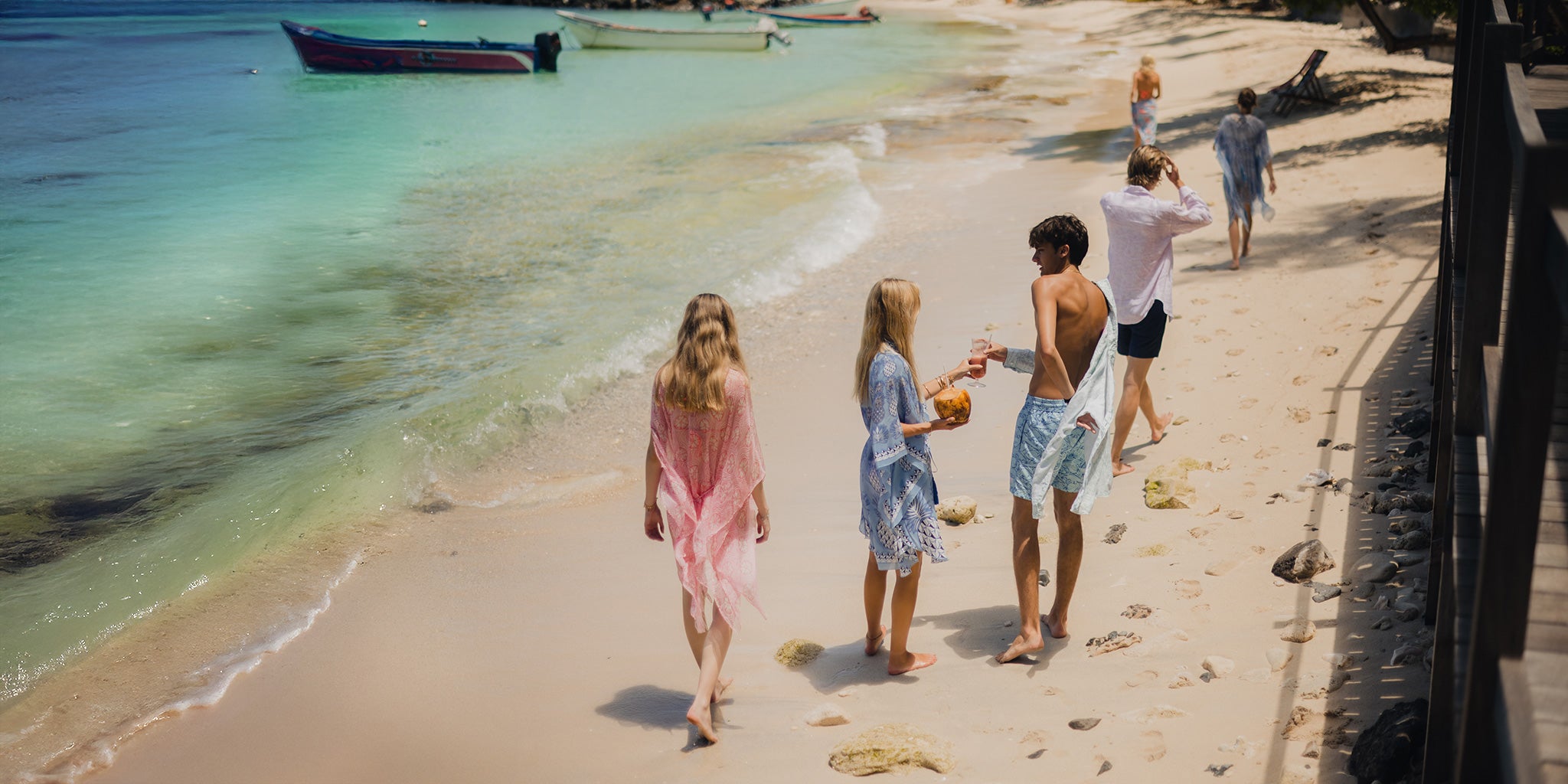 Mustique island lifestyle resortwear spring break kids walking on beach luxury holiday clothing collection