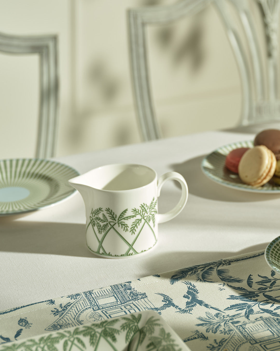 Fine bone china cream jug in Palms Sage Green design, elegant island tableware handmade in England for Pink House Mustique.