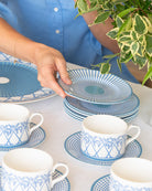 Tea set featuring fine bone china Palms Azure Blue cups and saucers and side plates styled for relaxed island dining.