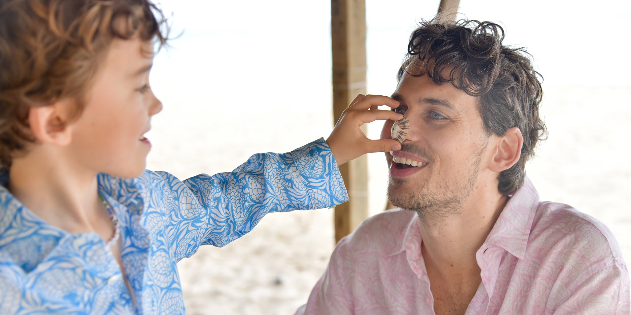 Matching Pangolin print father and son shirts from the Pink House Mustique Mini-Me collection