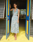 Jemima Whale Monochrome silk halterneck dress with tasselled waist tie in Mustique