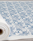 Pink House Toile blue 100% cotton furnishing fabric featuring Caribbean houses, palms and tropical island motifs
