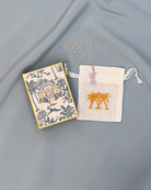 Sterling silver Mustique island pendant necklace with pink zirconia crystals Pink House Mustique gift box