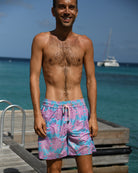 Men’s Agave turquoise and pink swim trunks in recycled quick-dry fabric by Lotty B for Pink House Mustique