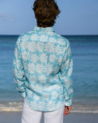 Close-up back of Agave turquoise blue print men’s linen shirt by Pink House Mustique.