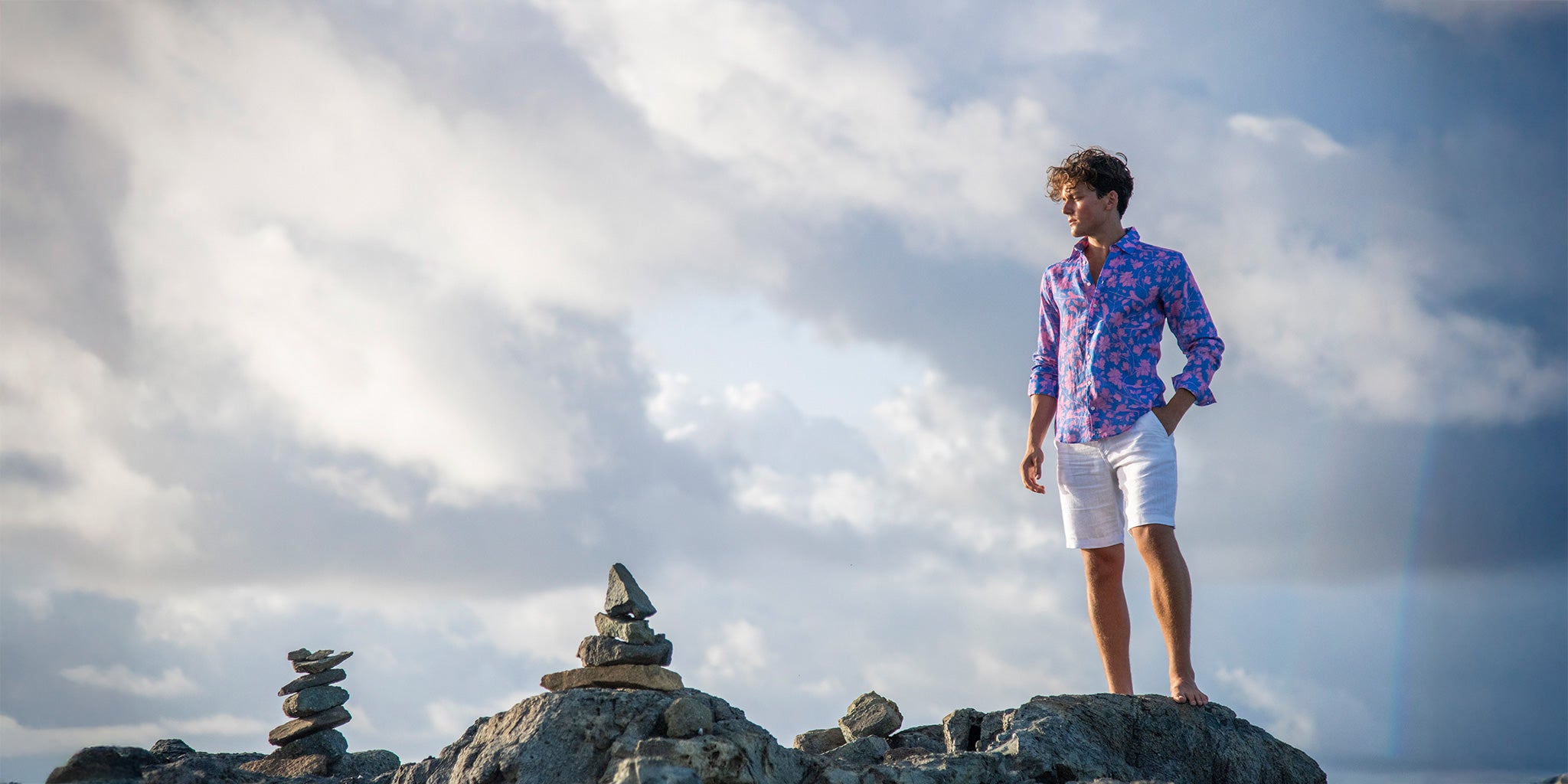 Men’s Resort 2026 Iguana Blue and Pink linen shirt from Lotty B Mustique, relaxed island luxury for beach and travel.