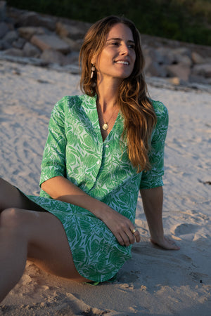 Womens luxury resort wear dress in blue green floral Protea print by Lotty B for Pink House Mustique