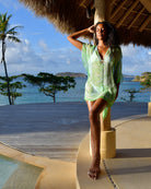 Sand Dollar green silk chiffon Cosima kaftan short luxury holiday beach cover up worn at Frenchman's Field Villa Mustique