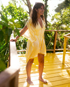 Womens silk CDC Cosima kaftan in yellow fan palm print, lightweight luxury resortwear for beach and holiday styling