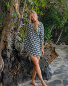 Designer silk Decima dress by Lotty B in black and white single Palm print, luxury fashion Mustique island.