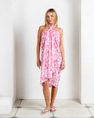 Silk CDC sarong in Parrot Pink styled halterneck – pure silk designer beachwear from Mustique