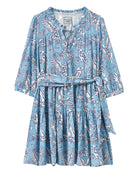 Women's silk tiered Amy dress in Parrot blue – luxury crepe-de-Chine resortwear by Lotty B, ideal for beach holidays and travel.