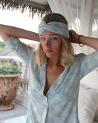 Matching silk headscarf and Pink House Decima Dress in Pineapple Olive – tropical printed silk outfit for chic resort wear and laid-back elegance.