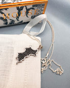 Hallmarked sterling silver Mustique island pendant with black zirconia crystals necklace Made in England