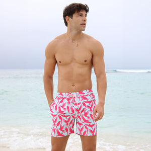 Tropical vacation men's swim shorts in turquoise blue and coral red Parrot print by designer Lotty B