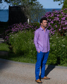 Linen vacation pants in dazzling blue styled with pink linen shirt. Resortwear by Pink House 