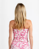 Back view of pure silk Parrot Pink bandeau top with shirred stretch fit and matching crepe shorts