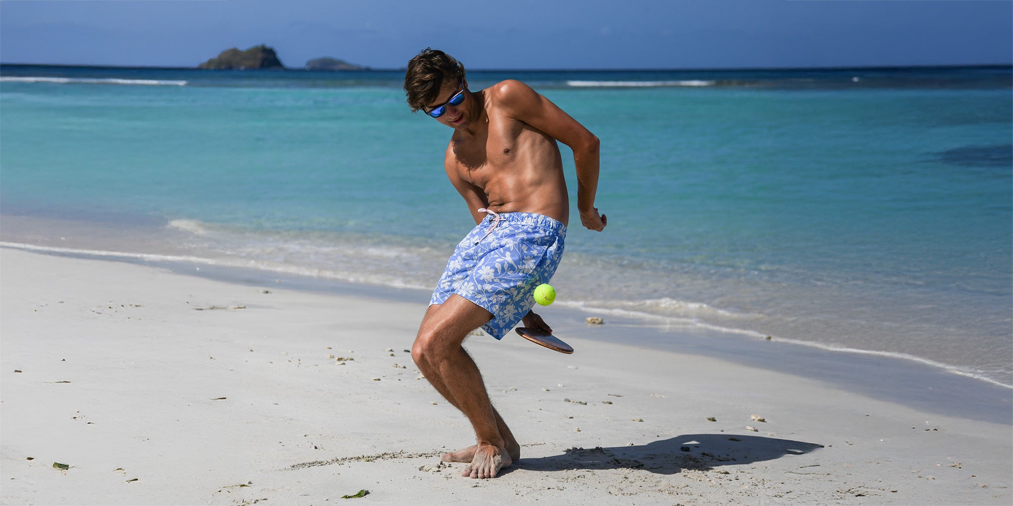 Eco-friendly men’s swim shorts in sustainable quick-dry fabric and premium Pink House Mustique design