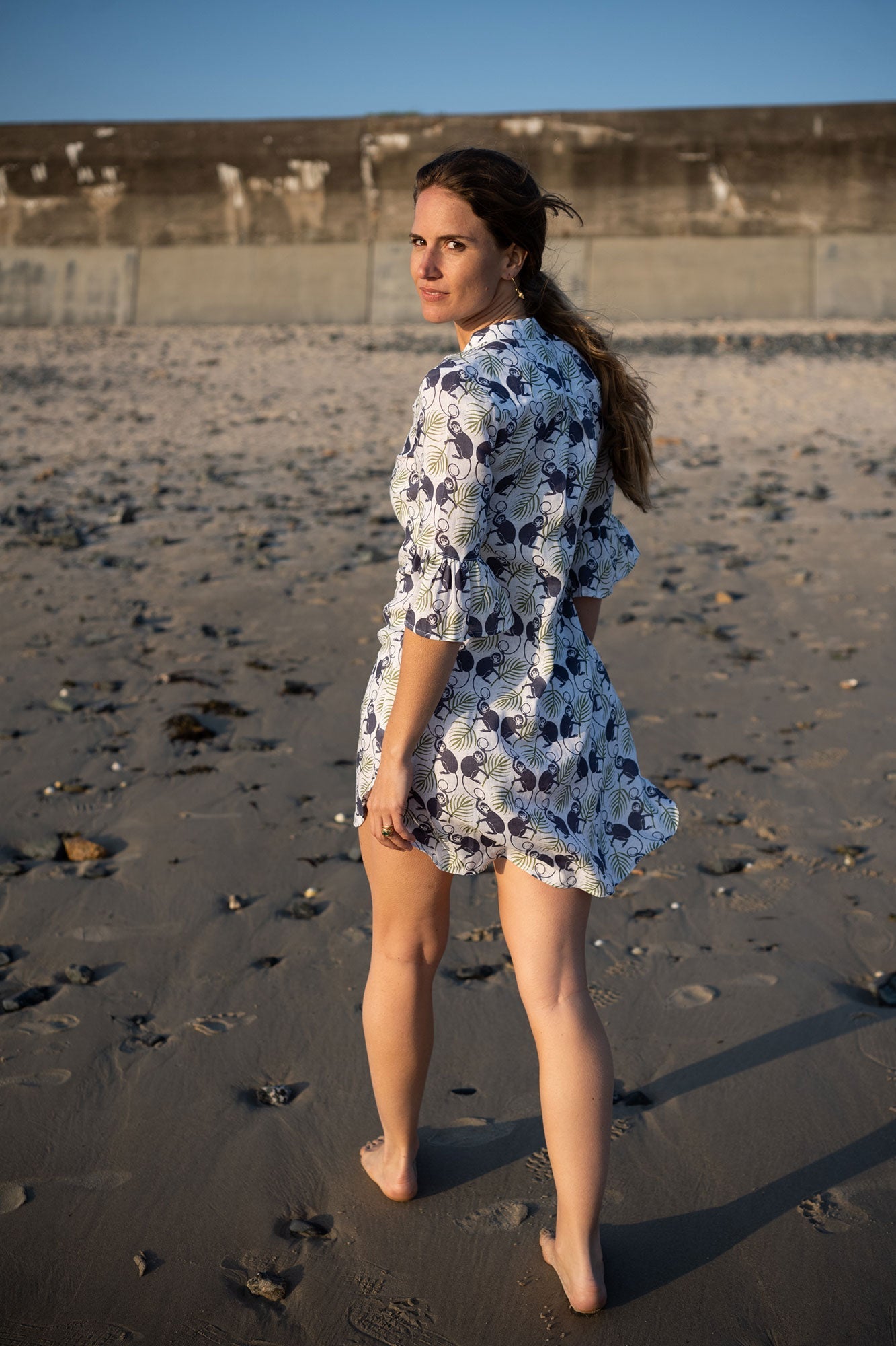 Women's easy linen beach vacation dress with frilled cuffs in green and navy Monkey print, the Decima dress by Pink House