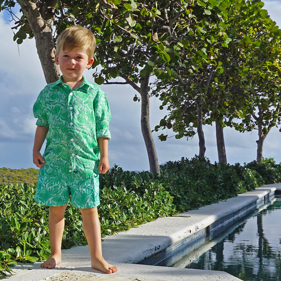 Boys sustainable swim shorts in green floral Protea print by Lotty B for Pink House Mustique