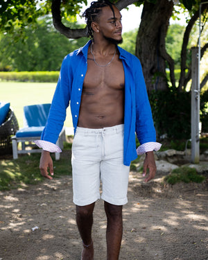 Men's linen holiday shirt in Caribbean dazzling blue, Cotton House Hotel, Mustique island