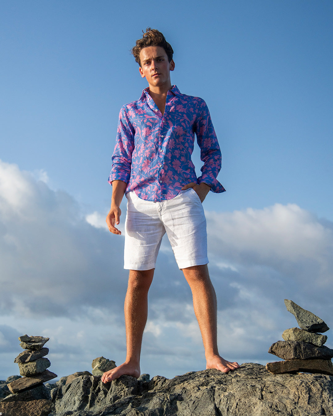 Men’s Iguana Blue & Pink linen shirt with white linen shorts — relaxed tropical island style by Pink House Mustique.