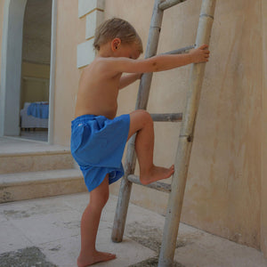Boys swim trunks : REGATTA BLUE Childrens swimwear Mustique lifestyle