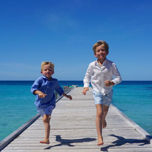Childrens Linen Shirt: WHITE running down the jetty Mustique