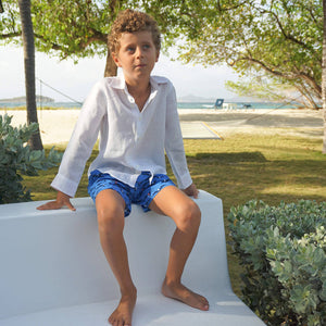 Softest, quick dry, recycled swimwear for boys in fun holiday prints by Lotty B Mustique