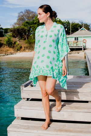 Style the Lotty Lime Tree green kaftan loose over a bikini 
