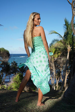Luxury vacation style pure silk Lime Tree green sarong designed by Lotty B Mustique