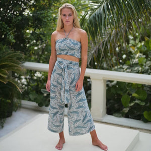 Crepe silk ruffle top in grey green monochrome Whale print worn with Palazzo pants by Lotty B Mustique luxury resort wear