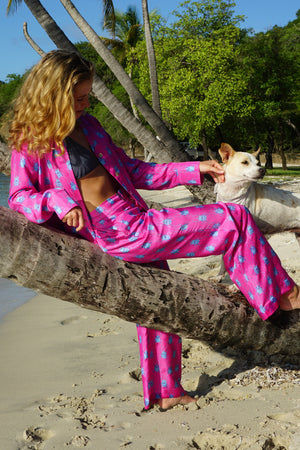 Numbered limited edition silk pajamas in vibrant blue and pink Beetle print by Lotty B Mustique