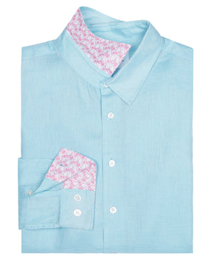 Folded Mens designer Linen Shirt by Lotty B for Pink House Mustique in plain Pale Blue
