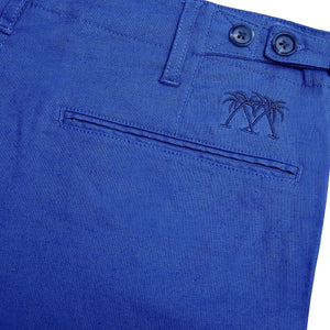 Mens Linen Trousers : DAZZLING BLUE back pocket & emblem detail, designer Lotty B for Pink House Mustique