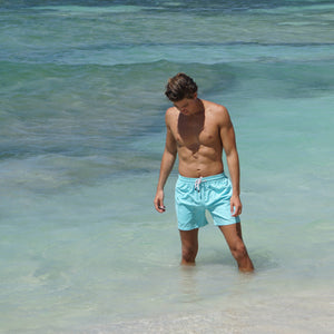 Mens quick dry swim shorts in turquoise, Pink House Mustique Caribbean resortwear