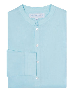 Folded Mens Collarless Linen Shirt : PALE BLUE. Designer Lotty B for Pink House Mustique. Exclusive Mens resort wear