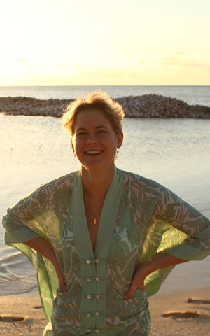 Tropical beach style buttoned poncho in floral green Protea print by Lotty B Mustique